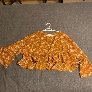 Orange floral bell sleeve top